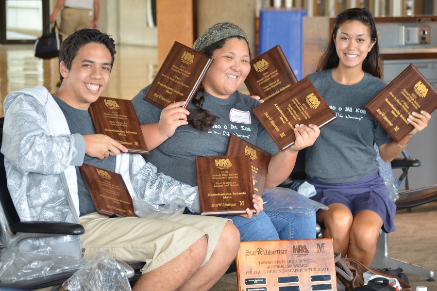 Reid Cairme, Maya Nitta and Mehana Lee of the class of 2013 hold up their awards from the Hawai'i Publishers Association High School Journalism Awards. These editors led their team to victory as duo overall state winners in both the print and online divisions of the competition.
