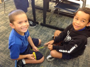 Kuhaupiʻo and Mafatu "hilo"ing their ti-leaves...maikaʻi boys!
