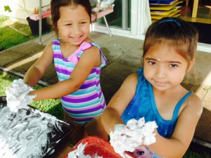 Chennoa and Sunshine playing with the shaving cream.