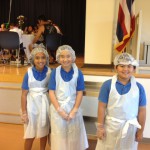 Our hard working lunch monitors ready to clear the tables on the stage!
